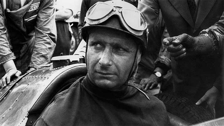 Juan Manuel Fangio in period Formula 1 car