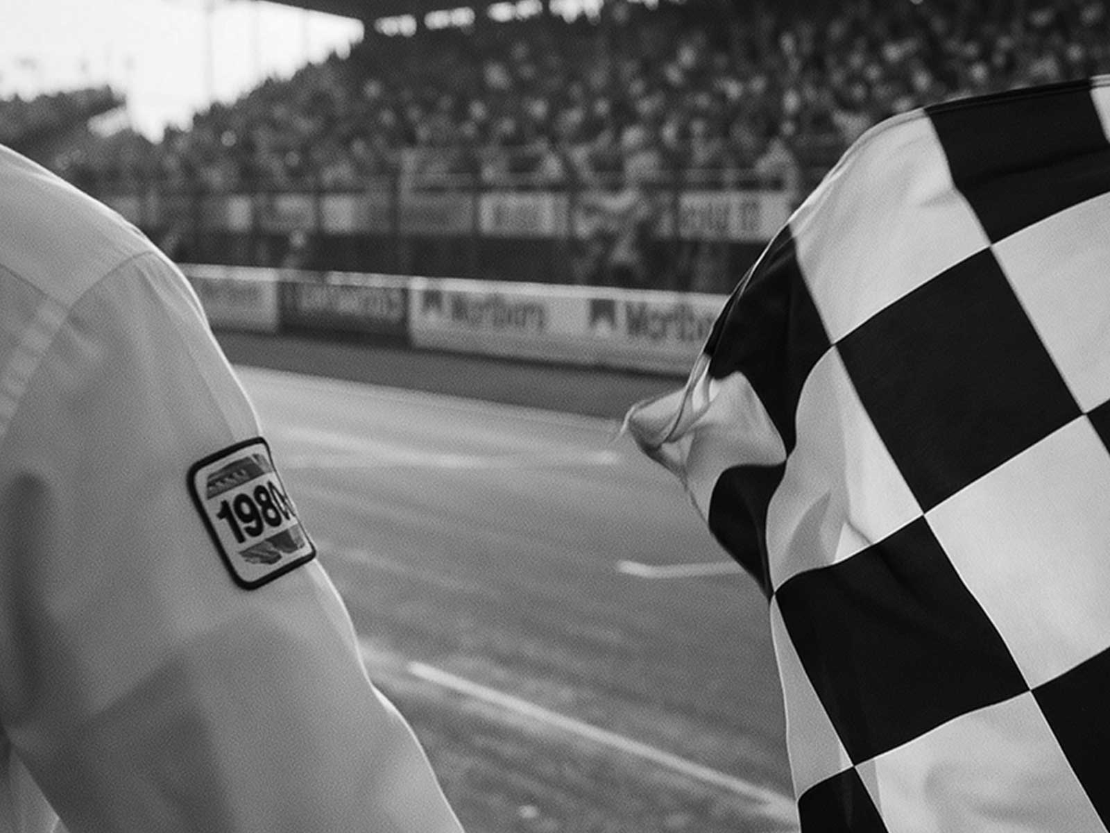 Alain Prost focused in the cockpit preparing for a race start, showcasing his analytical approach