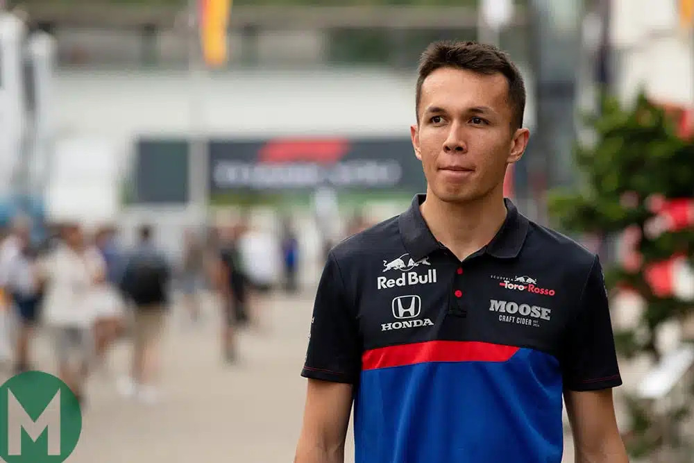 Alex Albon experiencing a front-wheel lock-up under heavy braking approaching a chicane