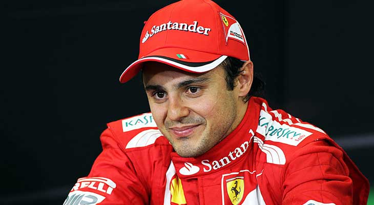Felipe Massa in his fire-resistant racing suit displaying sponsor patches and layered construction