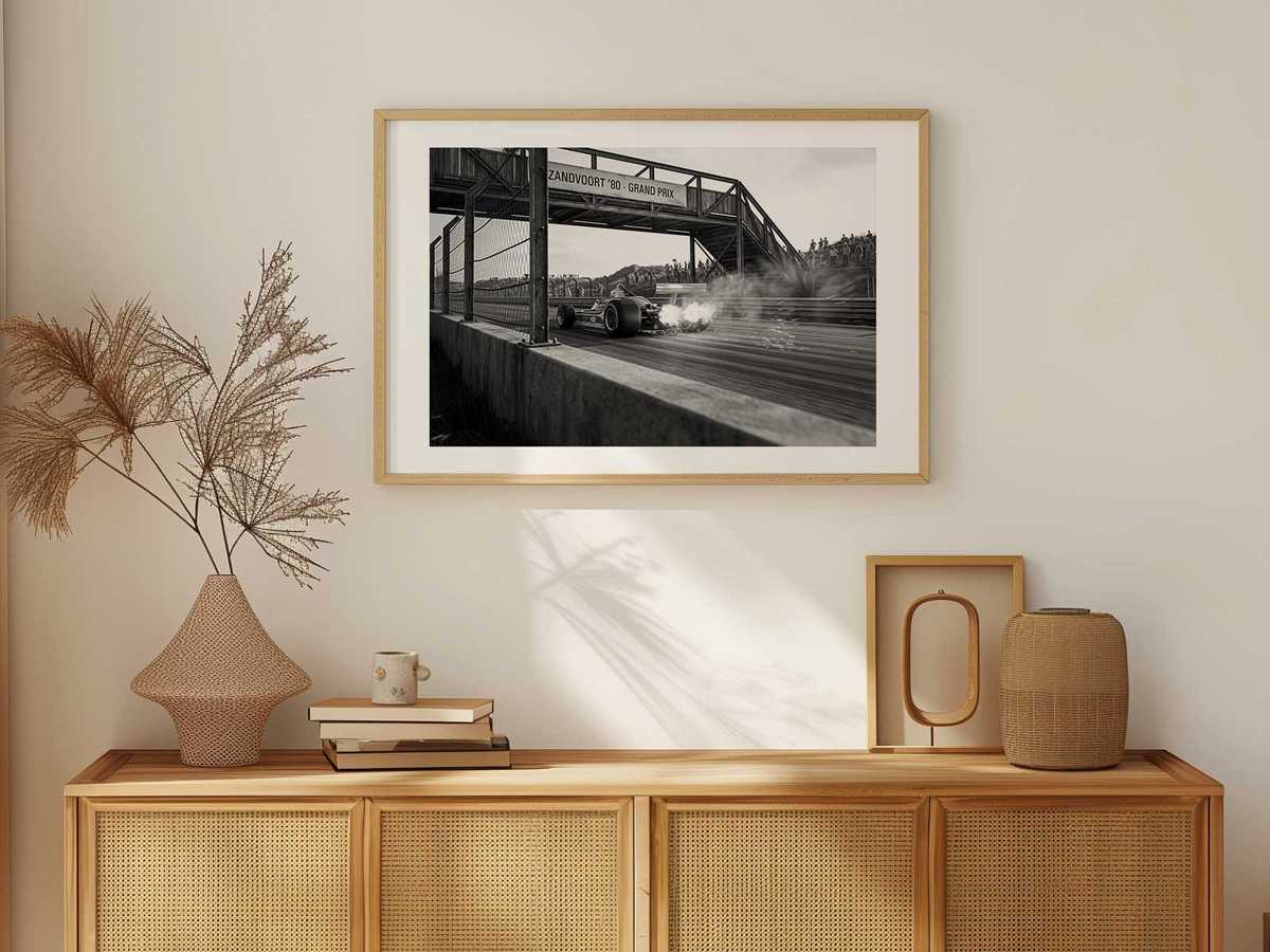 Silhouette of the Ferrari 312 T5 set within a framed vintage composition, suggesting a preserved piece of F1 heritage