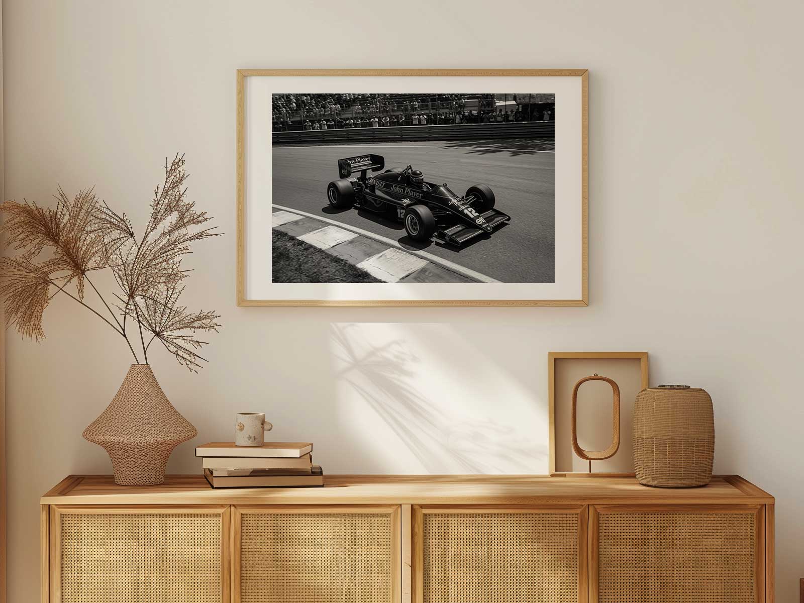 Gold and black Lotus F1 poster showcasing team livery and racing heritage