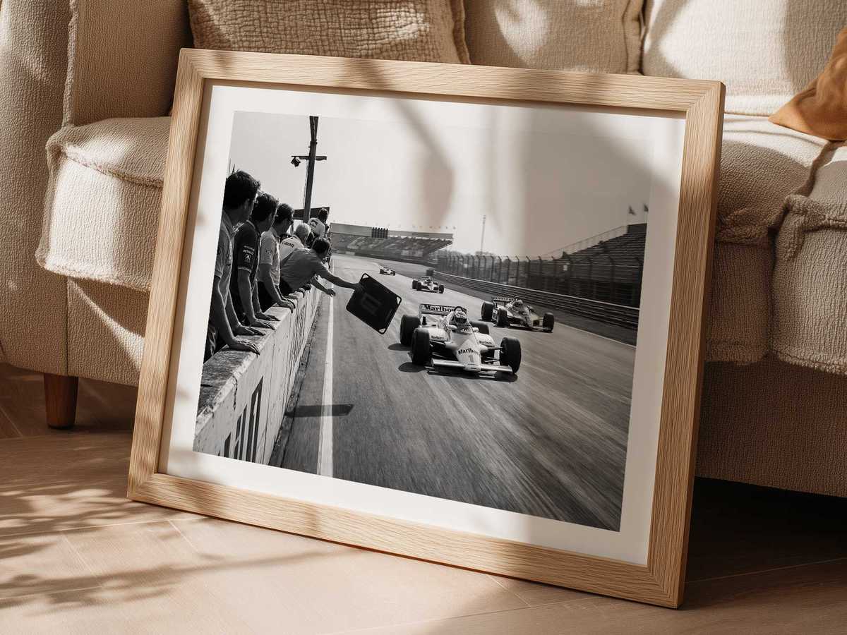 Williams FW40 on track in modern livery showing current aerodynamic contours and contemporary suspension geometry